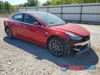 Czwarte zdjęcie samochodu z boku: 2020 TESLA MODEL 3 VIN:5YJ3E1EB6LF627886 - miniatura