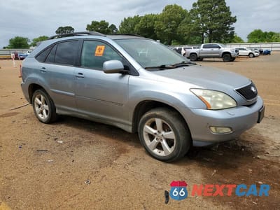 Czwarte zdjęcie samochodu z boku: 2007 LEXUS RX 350 VIN:2T2GK31U07C010678 - miniatura