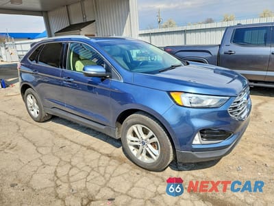 Czwarte zdjęcie samochodu z boku: 2019 FORD EDGE SEL VIN:2FMPK4J95KBB21102 - miniatura