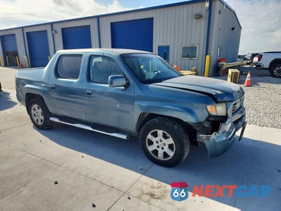 Czwarte zdjęcie samochodu z boku: 2007 HONDA RIDGELINE VIN:2HJYK16557H520685 - miniatura