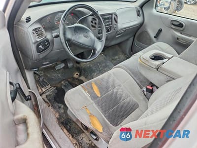 Zdjęcie 8 z 12 samochodu: 2001 FORD F150 VIN:1FTPF17M01KB25596 - miniatura