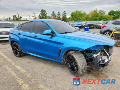 Czwarte zdjęcie samochodu z boku: 2018 BMW X6 M VIN:5YMKW8C50J0Y74709 - miniatura