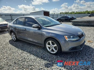 Czwarte zdjęcie samochodu z boku: 2011 VOLKSWAGEN JETTA TDI VIN:3VWLL7AJ4BM111703 - miniatura