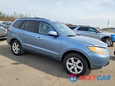 Czwarte zdjęcie samochodu z boku: 2009 HYUNDAI SANTA FE LIMITED VIN:5NMSH13E79H243333 - miniatura