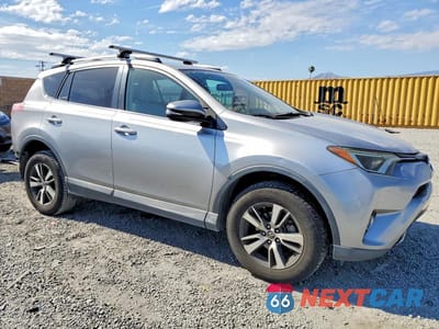 Czwarte zdjęcie samochodu z boku: 2016 TOYOTA RAV4 XLE VIN:2T3WFREV7GW271905 - miniatura