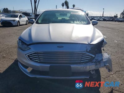 Piąte zdjęcie samochodu w środku: 2017 FORD FUSION SE HYBRID VIN:3FA6P0LU1HR266116 - miniatura