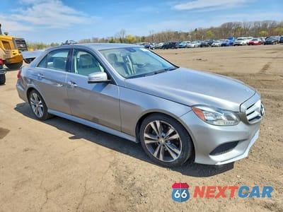 Czwarte zdjęcie samochodu z boku: 2015 MERCEDES-BENZ E 350 4MATIC VIN:WDDHF8JB1FB093193 - miniatura