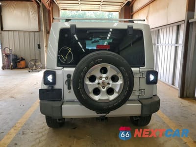 Zdjęcie 6 z 12 samochodu: 2011 JEEP WRANGER VIN:1J4HA7H1XBL612921 - miniatura