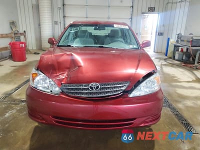 Piąte zdjęcie samochodu w środku: 2003 TOYOTA CAMRY LE VIN:4T1BE30K33U143594 - miniatura