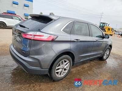 Trzecie zdjęcie samochodu z tyłu: 2023 FORD EDGE SEL VIN:2FMPK4J93PBA34421 - miniatura
