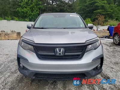 Piąte zdjęcie samochodu w środku: 2021 HONDA PILOT SE VIN:5FNYF5H24MB010879 - miniatura