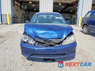 Piąte zdjęcie samochodu w środku: 2006 TOYOTA CAMRY LE VIN:4T1BE30K96U106117 - miniatura