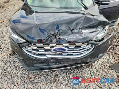 Zdjęcie 12 z 13 samochodu: 2019 FORD EDGE SEL VIN:2FMPK3J97KBB76094 - miniatura