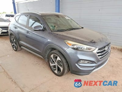 Czwarte zdjęcie samochodu z boku: 2017 HYUNDAI TUCSON SPORT VIN:KM8J33A23HU356682 - miniatura