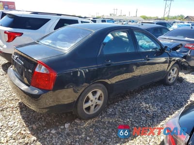 Trzecie zdjęcie samochodu z tyłu: 2004 KIA SPECTRA LX VIN:KNAFE121045018995 - miniatura