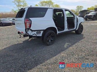 Czwarte zdjęcie samochodu z boku: 2022 CHEVROLET TAHOE K1500 VIN:1GNSKLED8NR304848 - miniatura