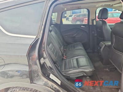 Zdjęcie 11 z 13 samochodu: 2014 FORD ESCAPE TITANIUM VIN:1FMCU0J93EUB10180 - miniatura