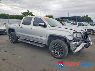 Czwarte zdjęcie samochodu z boku: 2017 GMC SIERRA K1500 SLT VIN:3GTU2NEC7HG408840 - miniatura