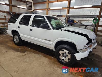 Czwarte zdjęcie samochodu z boku: 2003 CHEVROLET BLAZER VIN:1GNDT13XX3K173452 - miniatura