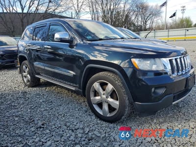 Czwarte zdjęcie samochodu z boku: 2013 JEEP GRAND CHEROKEE OVERLAND VIN:1C4RJFCT1DC620678 - miniatura