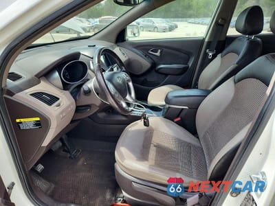 Zdjęcie 7 z 14 samochodu: 2012 HYUNDAI TUCSON GLS VIN:KM8JU3AC7CU443449 - miniatura