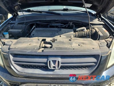 Zdjęcie 11 z 11 samochodu: 2004 HONDA PILOT EXL VIN:2HKYF187X4H605001 - miniatura