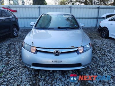 Piąte zdjęcie samochodu w środku: 2007 HONDA CIVIC LX VIN:1HGFA16597L037123 - miniatura