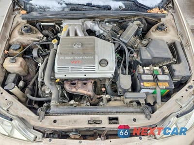 Zdjęcie 11 z 12 samochodu: 2002 TOYOTA AVALON XLS VIN:4T1BF28B32U266614 - miniatura