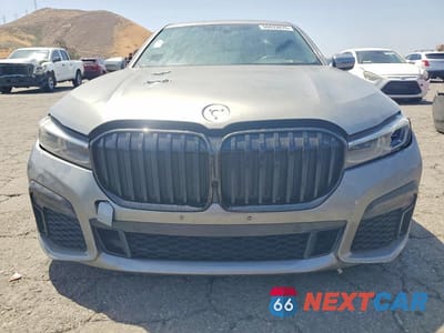 Czwarte zdjęcie samochodu z boku: 2020 BMW 750 XI VIN:WBA7U2C0XLCD49776 - miniatura
