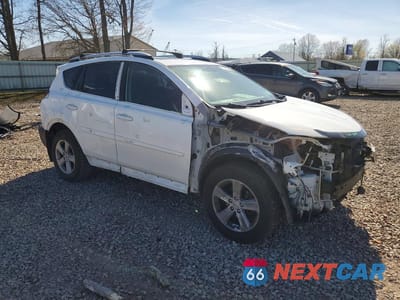 Czwarte zdjęcie samochodu z boku: 2014 TOYOTA RAV4 XLE VIN:JTMRFREV7EJ007821 - miniatura