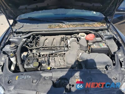 Zdjęcie 11 z 12 samochodu: 2016 FORD TAURUS SEL VIN:1FAHP2E87GG148162 - miniatura