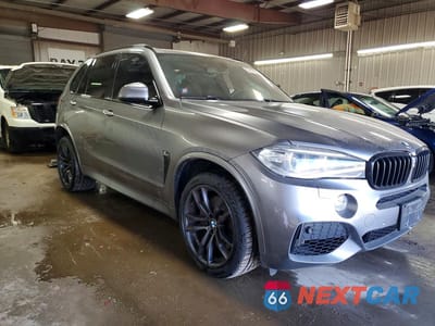 Czwarte zdjęcie samochodu z boku: 2014 BMW X5 XDRIVE50I VIN:5UXKR6C56E0J72709 - miniatura