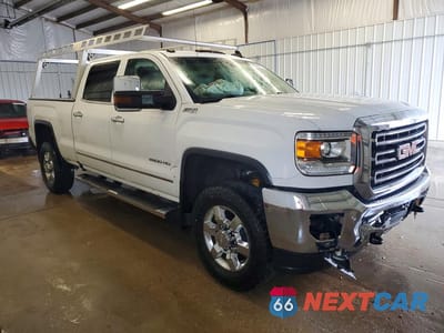 Czwarte zdjęcie samochodu z boku: 2019 GMC SIERRA K2500 SLT VIN:1GT12REG8KF262342 - miniatura