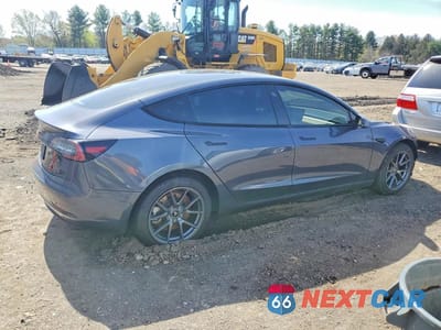 Trzecie zdjęcie samochodu z tyłu: 2021 TESLA MODEL 3 VIN:5YJ3E1EA5MF092784 - miniatura