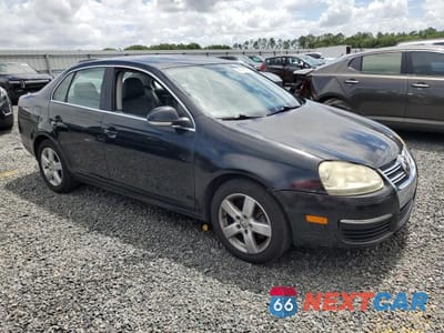 Czwarte zdjęcie samochodu z boku: 2009 VOLKSWAGEN JETTA SE VIN:3VWRM71K99M169705 - miniatura