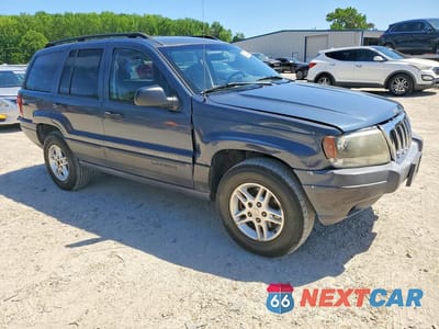 Czwarte zdjęcie samochodu z boku: 2003 JEEP GRAND CHEROKEE LAREDO VIN:1J4GX48S63C581282 - miniatura