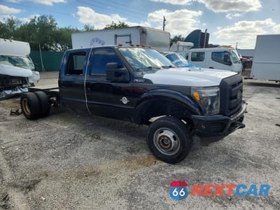 Czwarte zdjęcie samochodu z boku: 2016 FORD F350 SUPER DUTY VIN:1FT8W3DT5GEC99554 - miniatura