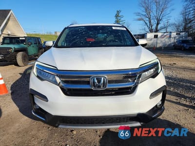 Piąte zdjęcie samochodu w środku: 2021 HONDA PILOT TOURING VIN:5FNYF6H69MB051565 - miniatura
