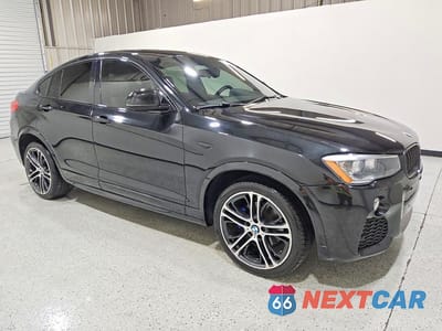 Czwarte zdjęcie samochodu z boku: 2015 BMW X4 XDRIVE28I VIN:5UXXW3C59F0F88917 - miniatura