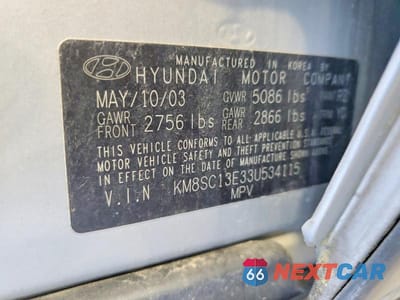 Zdjęcie 12 z 12 samochodu: 2003 HYUNDAI SANTA FE GLS VIN:KM8SC13E33U534115 - miniatura
