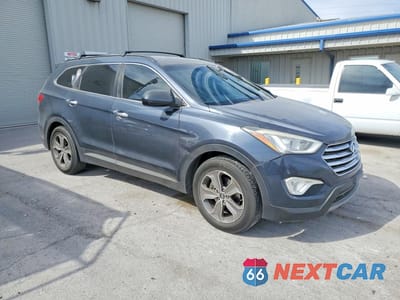 Czwarte zdjęcie samochodu z boku: 2014 HYUNDAI SANTA FE GLS VIN:KM8SMDHFXEU044094 - miniatura