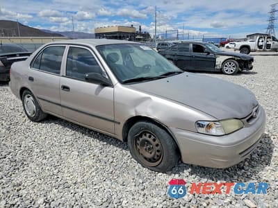 Czwarte zdjęcie samochodu z boku: 1999 TOYOTA COROLLA VE VIN:1NXBR12E2XZ231168 - miniatura