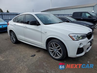 Czwarte zdjęcie samochodu z boku: 2015 BMW X4 XDRIVE28I VIN:5UXXW3C5XF0M89150 - miniatura