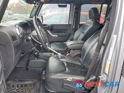 Zdjęcie 7 z 11 samochodu: 2013 JEEP WRANGLER UNLIMITED SAHARA VIN:1C4HJWEG8DL571605 - miniatura