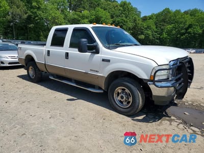 Czwarte zdjęcie samochodu z boku: 2002 FORD F250 SUPER DUTY VIN:1FTNW21F32EC36327 - miniatura