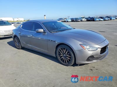 Czwarte zdjęcie samochodu z boku: 2016 MASERATI GHIBLI VIN:ZAM57XSA4G1175013 - miniatura