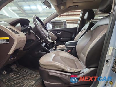 Zdjęcie 7 z 13 samochodu: 2011 HYUNDAI TUCSON GLS VIN:KM8JUCAC7BU212579 - miniatura