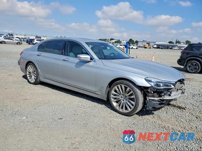 Czwarte zdjęcie samochodu z boku: 2017 BMW 750 I VIN:WBA7F0C52HGM21173 - miniatura