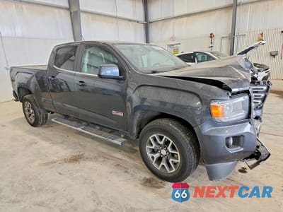 Czwarte zdjęcie samochodu z boku: 2016 GMC CANYON SLE VIN:1GTG6CE37G1115216 - miniatura