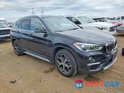 Czwarte zdjęcie samochodu z boku: 2017 BMW X1 XDRIVE28I VIN:WBXHT3C3XH5F70822 - miniatura